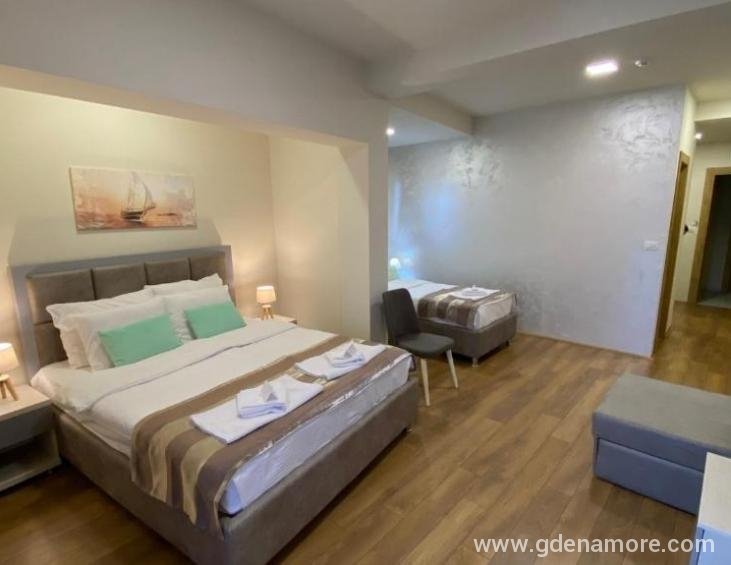 deluxe triple room with sea view
