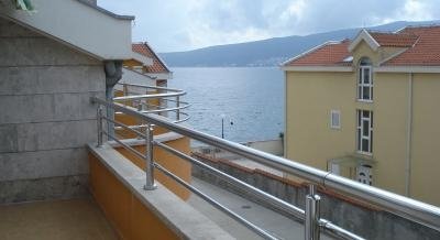 White apartments, private accommodation in city Bijela, Montenegro