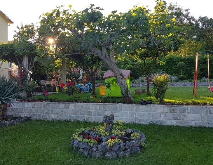 Garden with a view on children playground area