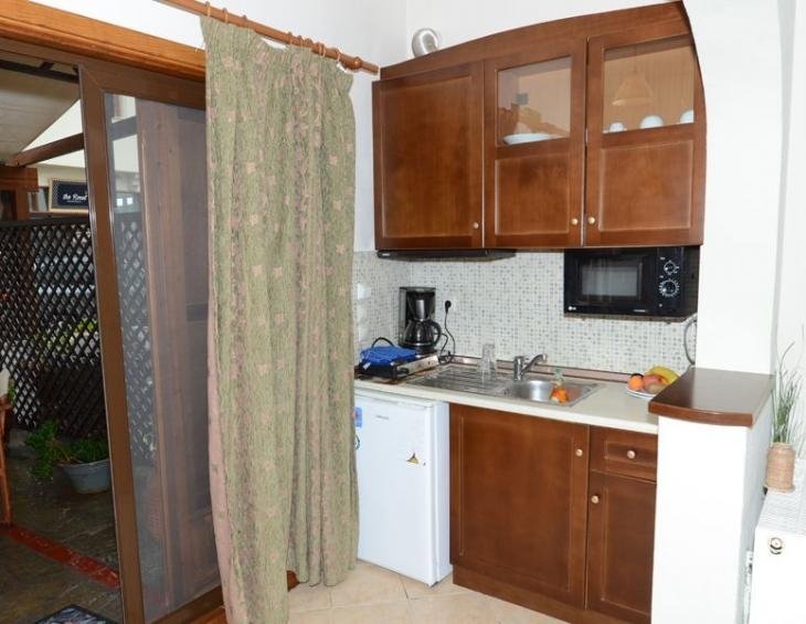 xenonas-nostos-rooms-ammouliani-athos-4-bed-apartm