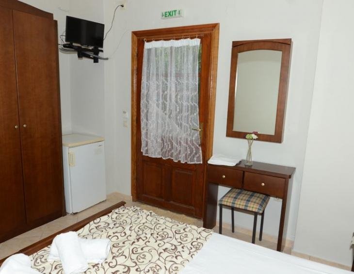 xenonas-nostos-rooms-ammouliani-athos-4-bed-apartm