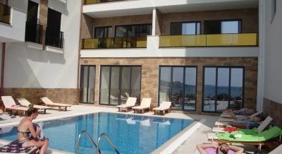 Lux apartman sa bazenom i privatnom plazom, частни квартири в града Saranda, Albania