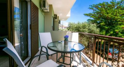 Evi's Studios, private accommodation in city Potos, Greece