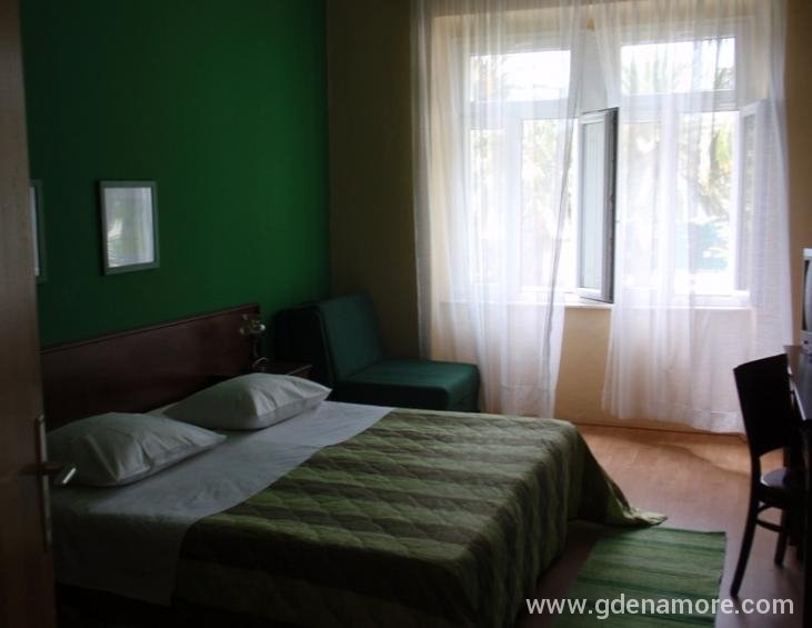 Spavaca soba zelenog apartmana